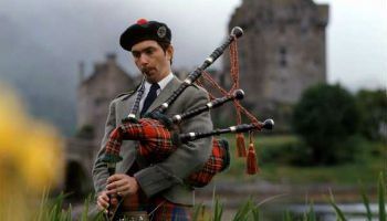The bagpipes, played in the stunning grounds of Eilean Castle, Scotland.