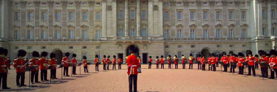 Buckingham Palace, the home of the Queen of England in London, with the famous Royal Guards outside.